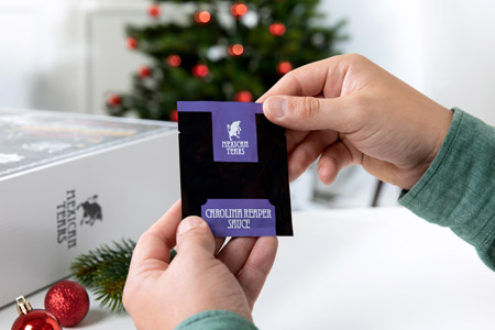 Adventskalender chili-sauce auspacken